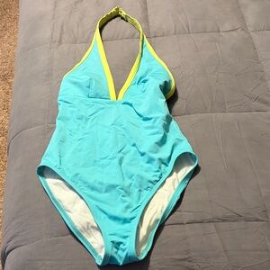 Never worn one piece swim suit. Medium